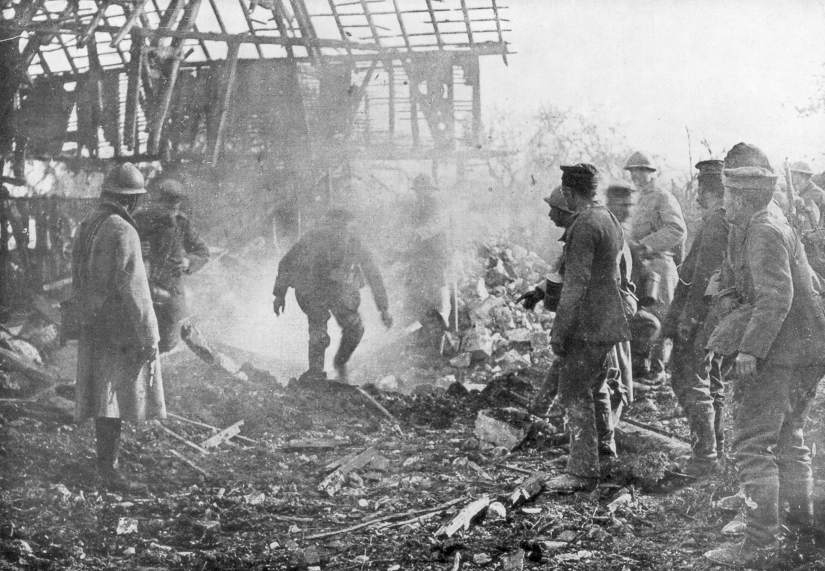 French troops using flamethrowers to flush out Germans from their shelters, Cantigny, France, 1918.